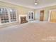 Spacious living room with fireplace and lots of natural light, providing a comfortable space at 2025 Sojourn Rd, Marshville, NC 28103