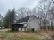 Outbuilding showcasing its simple construction, sheltered space, and additional storage capabilities at 2025 Sojourn Rd, Marshville, NC 28103