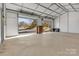 This oversized garage with roll up doors and concrete floor presents so many possibilities at 2211 Waverly St, Albemarle, NC 28001