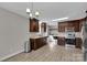 Spacious kitchen with stainless steel appliances, granite counters, and a laundry area at 2211 Waverly St, Albemarle, NC 28001