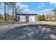 Two-car metal outbuilding and gravel driveway, perfect for storage or workshop at 2211 Waverly St, Albemarle, NC 28001