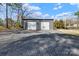 Two-car metal outbuilding and gravel driveway, perfect for storage or workshop at 2211 Waverly St, Albemarle, NC 28001