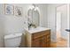 Bathroom with new vanity and countertop, brass faucet, globe light fixture and subway tile at 2232 Glenraven Ave, Gastonia, NC 28052