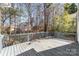 Spacious back deck featuring wood railing and offering outdoor living space at 2320 Christensens Ct, Charlotte, NC 28270