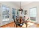 Breakfast nook with french door access to the deck and natural light at 2320 Christensens Ct, Charlotte, NC 28270