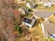 Aerial view showcasing a backyard with gazebo, fire pit, and solar panels on house roof at 2437 Grinstead Ct, Clover, SC 29710