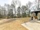 Large backyard features a swing set and gazebo with ample space for outdoor activities and entertaining at 2437 Grinstead Ct, Clover, SC 29710