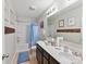 Functional bathroom with double sink vanity, neutral walls, tub and shower combo at 2437 Grinstead Ct, Clover, SC 29710