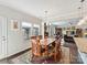 Bright dining room features hardwood floors and seamlessly connects to the adjacent living area at 2437 Grinstead Ct, Clover, SC 29710