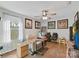 Inviting living room with plenty of natural light from the window with a ceiling fan at 2437 Grinstead Ct, Clover, SC 29710