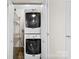 Convenient laundry closet featuring a stacked washer and dryer unit at 2500 Danforth Ln, Charlotte, NC 28208