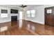 Spacious living room featuring a fireplace, hardwood floors, and natural light at 2919 Park Rd, Charlotte, NC 28209