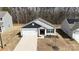 Charming home featuring an attached garage, tidy landscaping, and gray siding at 3122 Maple Ridge Dr, Gastonia, NC 28052