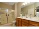 Bathroom with a glass-enclosed shower and double sink vanity at 313 Garner Dr, Salisbury, NC 28146