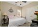 Comfortable bedroom with a ceiling fan and a soft color palette at 313 Garner Dr, Salisbury, NC 28146