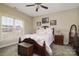 Comfortable primary bedroom with warm lighting, stylish furnishings, and a ceiling fan at 313 Garner Dr, Salisbury, NC 28146