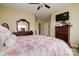 Large primary bedroom with elegant decor, ceiling fan and substantial wardrobe at 313 Garner Dr, Salisbury, NC 28146