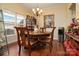 Dining room with a wooden table and chairs, chandelier, and hutch at 313 Garner Dr, Salisbury, NC 28146