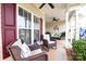Cozy porch with comfortable seating, ceiling fans, and views of the green landscape at 313 Garner Dr, Salisbury, NC 28146
