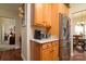 Kitchen offers stainless steel fridge, coffee maker, and wooden cabinets, adjacent to the breakfast area at 313 Garner Dr, Salisbury, NC 28146