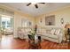 The living room features wood floors, neutral colors, and comfortable furniture at 313 Garner Dr, Salisbury, NC 28146