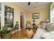 Cozy sunroom with tile flooring, comfortable seating, and lots of natural light at 313 Garner Dr, Salisbury, NC 28146