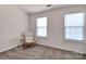 Bright carpeted bedroom with natural light and neutral walls at 3209 Blythe Ridge Ct, Charlotte, NC 28213