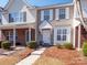 Inviting townhome with brick accents, white trim, and a cozy front entrance at 3209 Blythe Ridge Ct, Charlotte, NC 28213