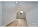 Finished attic space offering storage and a window for natural light at 324 Cabarrus W Ave, Concord, NC 28025