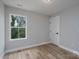 Bright bedroom with natural light coming through the window at 324 Cabarrus W Ave, Concord, NC 28025