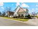 Charming home featuring a stone-accented facade, well-maintained lawn, and inviting entryway at 3320 Tulip Tree Ln, Charlotte, NC 28273