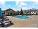 Community pool with lounge chairs and well-kept grounds for outdoor relaxation at 3320 Tulip Tree Ln, Charlotte, NC 28273