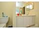 Bright bathroom with a toilet, vanity, and sink at 3345 Hunting Wood Ct, Gastonia, NC 28052