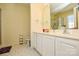 Bathroom with double sinks, a large mirror, a toilet, and a glass-enclosed shower at 3345 Hunting Wood Ct, Gastonia, NC 28052