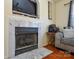 Close-up of fireplace with marble surround and hearth at 3345 Hunting Wood Ct, Gastonia, NC 28052