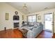 Inviting living room featuring a fireplace and hardwood floors at 3345 Hunting Wood Ct, Gastonia, NC 28052