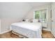 Cozy bedroom with natural light and neutral decor at 3615 Henshaw Rd, Charlotte, NC 28209