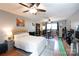 A large bedroom featuring a ceiling fan, and an in home office at 4000 Bridgewood Ln, Charlotte, NC 28226