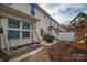 View of the backyard featuring a swing set, patio, and lawn at 4075 Creekstone Trce, Gastonia, NC 28056