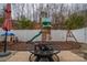 Backyard with playground, swing set and a firepit at 4075 Creekstone Trce, Gastonia, NC 28056