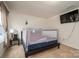 Bedroom featuring carpet flooring and a mounted television on the wall at 4075 Creekstone Trce, Gastonia, NC 28056