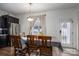 Cozy dining area featuring a neutral color scheme and plenty of natural light at 4075 Creekstone Trce, Gastonia, NC 28056