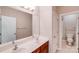 Bathroom featuring a double sink vanity with a large mirror, providing ample space and functionality at 485 Sutro Forest Nw Dr, Concord, NC 28027