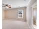 Bedroom with plush carpet and natural light at 485 Sutro Forest Nw Dr, Concord, NC 28027