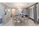 Dining room with a chandelier, buffet, and window at 485 Sutro Forest Nw Dr, Concord, NC 28027