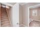 Hallway with stairs leading to the laundry room at 485 Sutro Forest Nw Dr, Concord, NC 28027