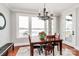 Bright dining area with lake views, ideal for enjoying meals and entertaining with a picturesque backdrop at 5086 Windward Point Ln, Denver, NC 28037