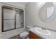 Traditional bathroom with a glass enclosed tub and vanity at 515 Panhandle Rd, Gold Hill, NC 28071