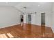 Large bedroom with hardwood floors and barn doors at 515 Panhandle Rd, Gold Hill, NC 28071