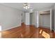 Bedroom featuring an open closet and hardwood floors at 515 Panhandle Rd, Gold Hill, NC 28071